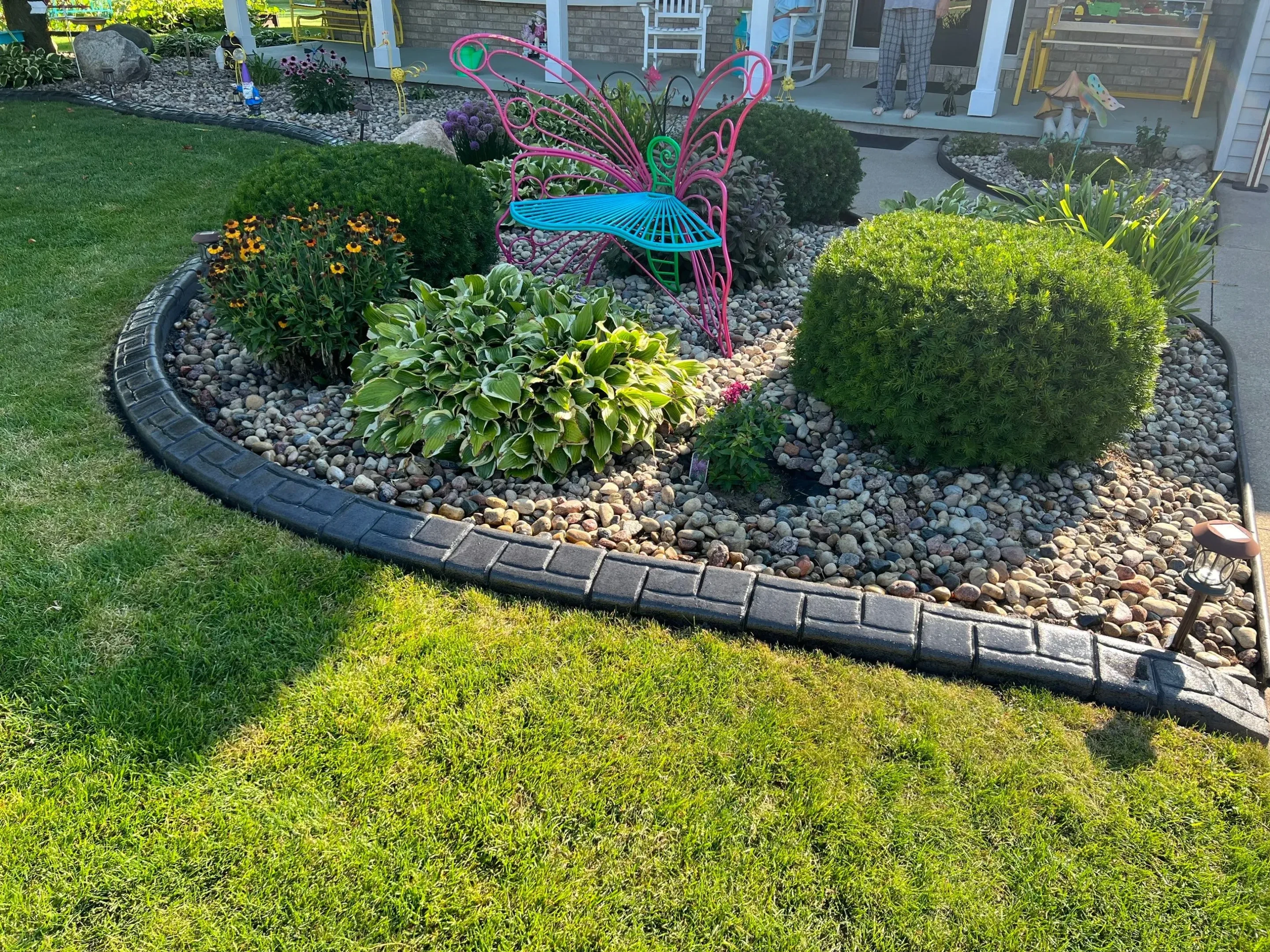 Stamped curbing with natural stone pattern